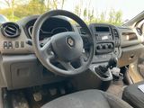 a dashboard of a car with a steering wheel and dashboard controls