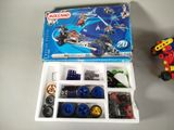 a box of legos and a toy car on a table