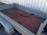 an image of a truck with a bed full of dirt
