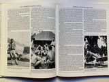 an open book with pictures of people sitting on a bench