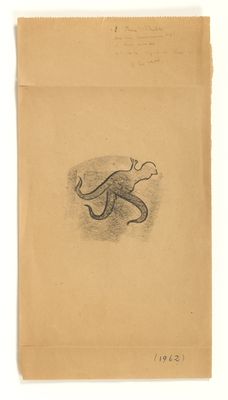 un dessin représentant une pieuvre sur un morceau de papier brun