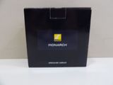 a close up of a black box on a white surface