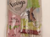 un sachet de friandises pour chien posé sur la table