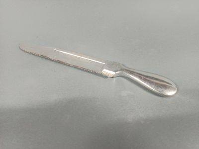 a knife that is sitting on a table
