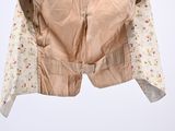 an image of a woman ' s jacket on a mannequin mannequin