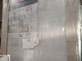 a picture of a refrigerator in the middle of a room