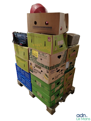 many boxes stacked on top of each other on a pallet