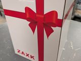 a white box with a red ribbon and a red bow on it