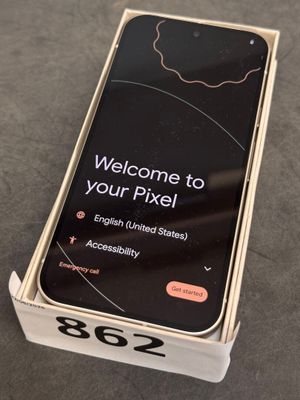 a close up of a cell phone in a box on a table