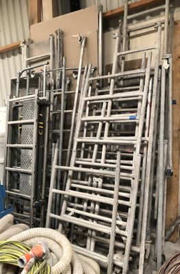 many different types of pipes and hoses in a warehouse