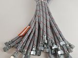a close up of a bunch of wires on a white surface