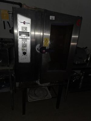 an image of a commercial oven in a dark room