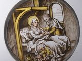 a picture of a christmas ornament with a picture of a man and a woman