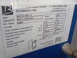 an image of a blue machine with a label on it