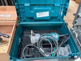a blue tool box with tools inside of it