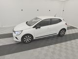 the small white car is parked in the garage