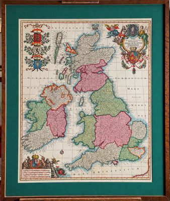 an old map of the british isles in a wooden frame