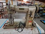 a sewing machine that is sitting on a table