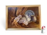 une photo d'un tableau représentant des fleurs posées sur une table