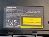 a close up of a black and yellow label on the back of a car