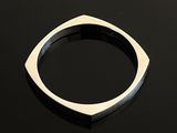 an image of a ring on a black surface