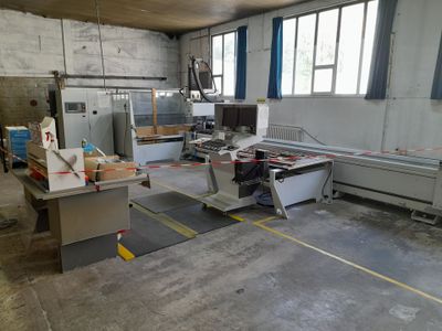an image of a factory that has a lot of machines in it