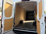 a white van that is open with the door open