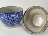 a blue and white bowl and a blue and white bowl