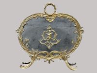 Ecran de cheminée en bronze de style Louis XV à decor d'ange… (photo 2)