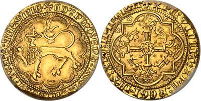 une pièce d'or sur laquelle est représenté un lion