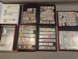 many different types of stamps on a table