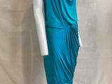 a woman ' s turquoise dress on a mannequin mannequin mannequin mannequin mannequin mannequin mannequin mannequin