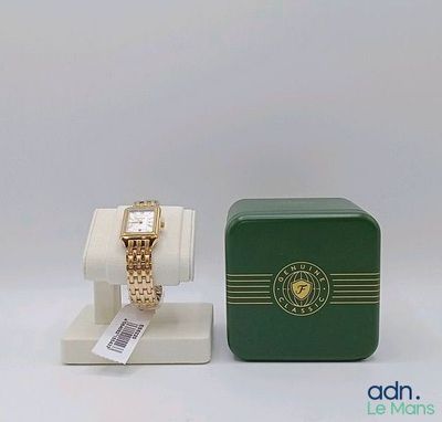 an image of a green box with a watch on it and a box with a watch on it