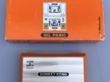 a box of game and watch cards on a table