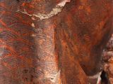 close up of a statue of a man with a hat on his head