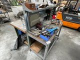 an image of a workbench with tools on it