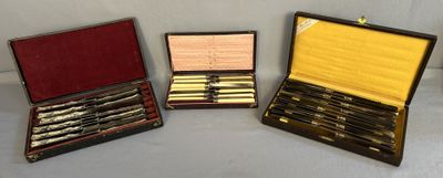 three different types of pens are in a case on a table