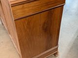 an image of a wooden desk in a room