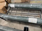 a lot of metal pipes that are on the floor