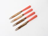 a set of four wooden handled crochet hooks with red handles