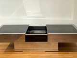 an image of a coffee table with a drawer on top of it