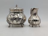 pair of antique silverplated sugar and creamers
