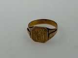 an image of a gold signet ring with the letter r on it
