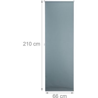 un gros plan d'un grand miroir accroché à un mur blanc