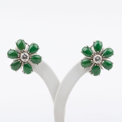 a pair of green jade and diamond flower earrings