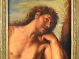 une peinture à l'huile représentant un homme aux cheveux longs et torse nu