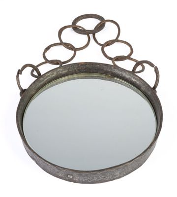 an image of a round mirror with a metal frame and chain around it