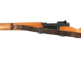 a close up of a rifle on a white background with a white background