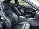 the interior of a car with black leather seats and black leather trims