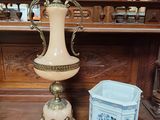 two vases sitting on a wooden table in a store
